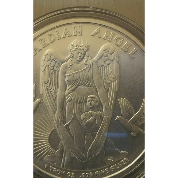 Guardian Angel NIUE 1 dollar 1 oz .999 silver coin. Framed with display stand. - Picture 4 of 6
